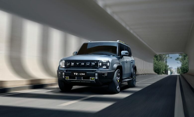 Jetour T2 SUV cruising through a contemporary tunnel, showcasing sleek modern design.