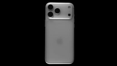 Back of a silver smartphone with three cameras.