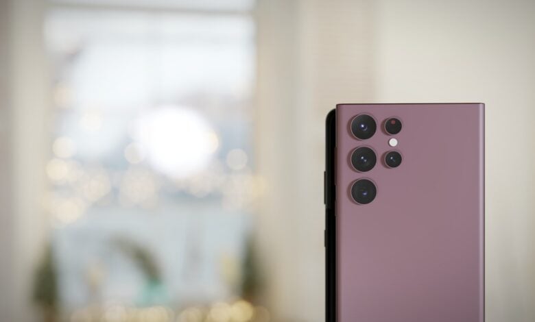 a close up of a cell phone with a blurry background